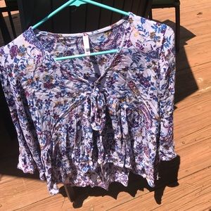 Cute and bright Boho v neck loose top.